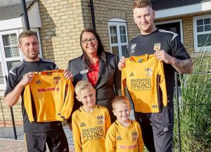 Pictured from left Kingswood United team coaches James McDonald and Ricky Foster with Beal Homes’ sales executive from Kings Vale and young players Mason and Harry